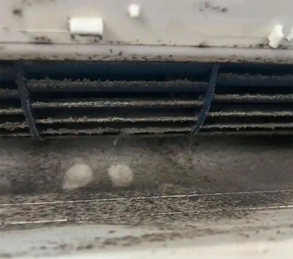 陇县空调吹的风有股烧焦味是怎么回事